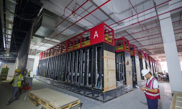 Rack systems being installed in a data hall